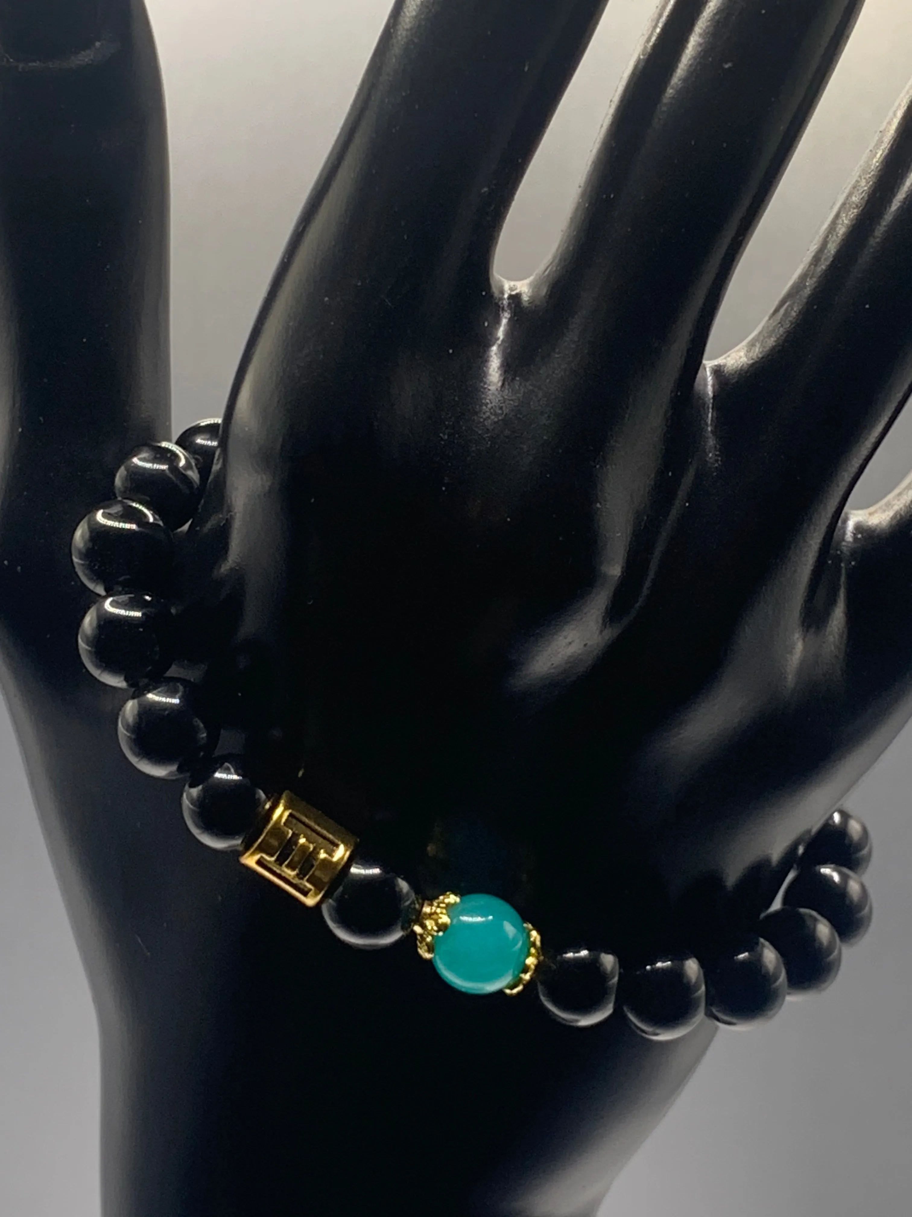 Gemini Zodiac black obsidian with aquamarine chalcedony elastic beaded bracelet with gold accents