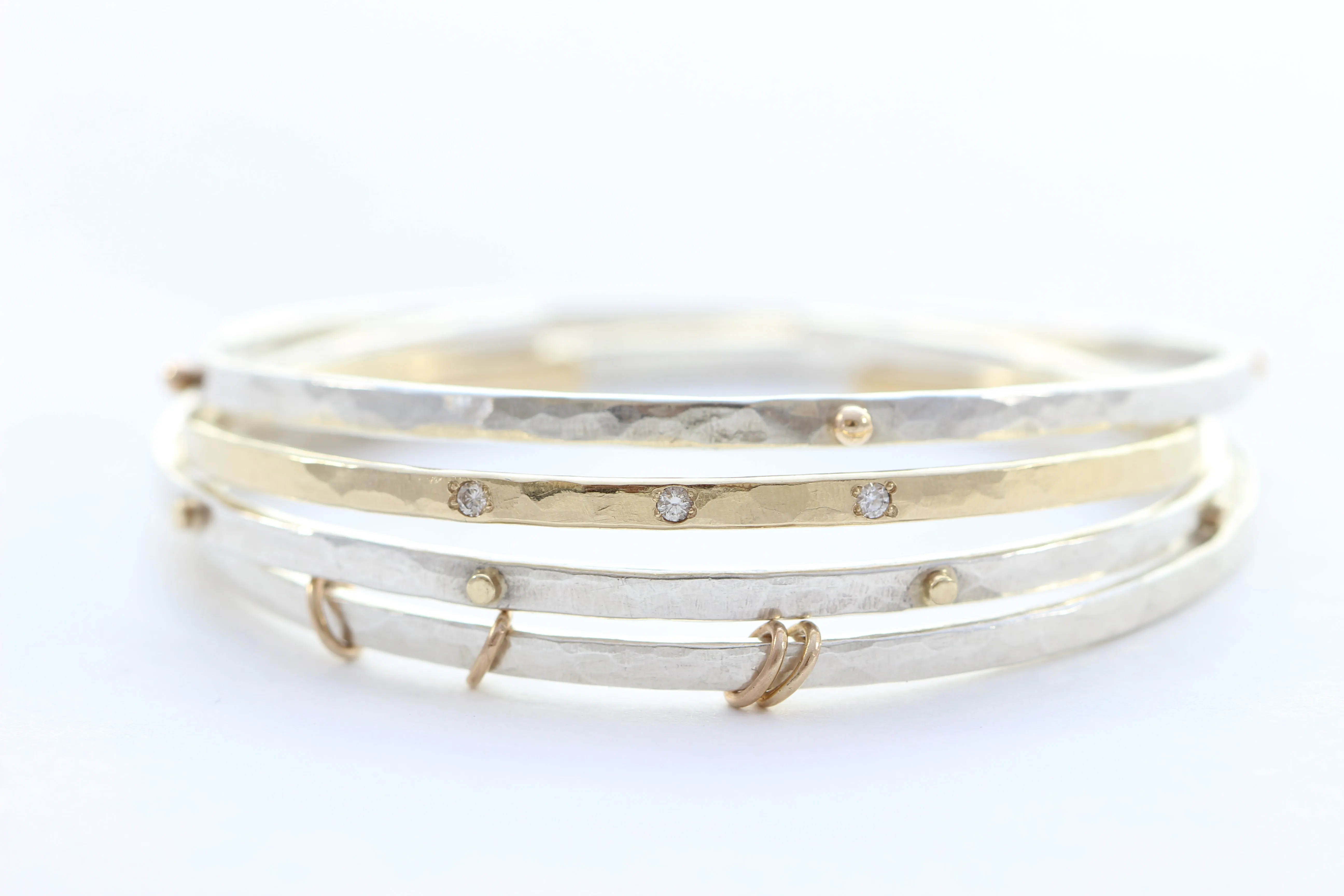 Thin hammered cuff bracelet with 8 gold wires