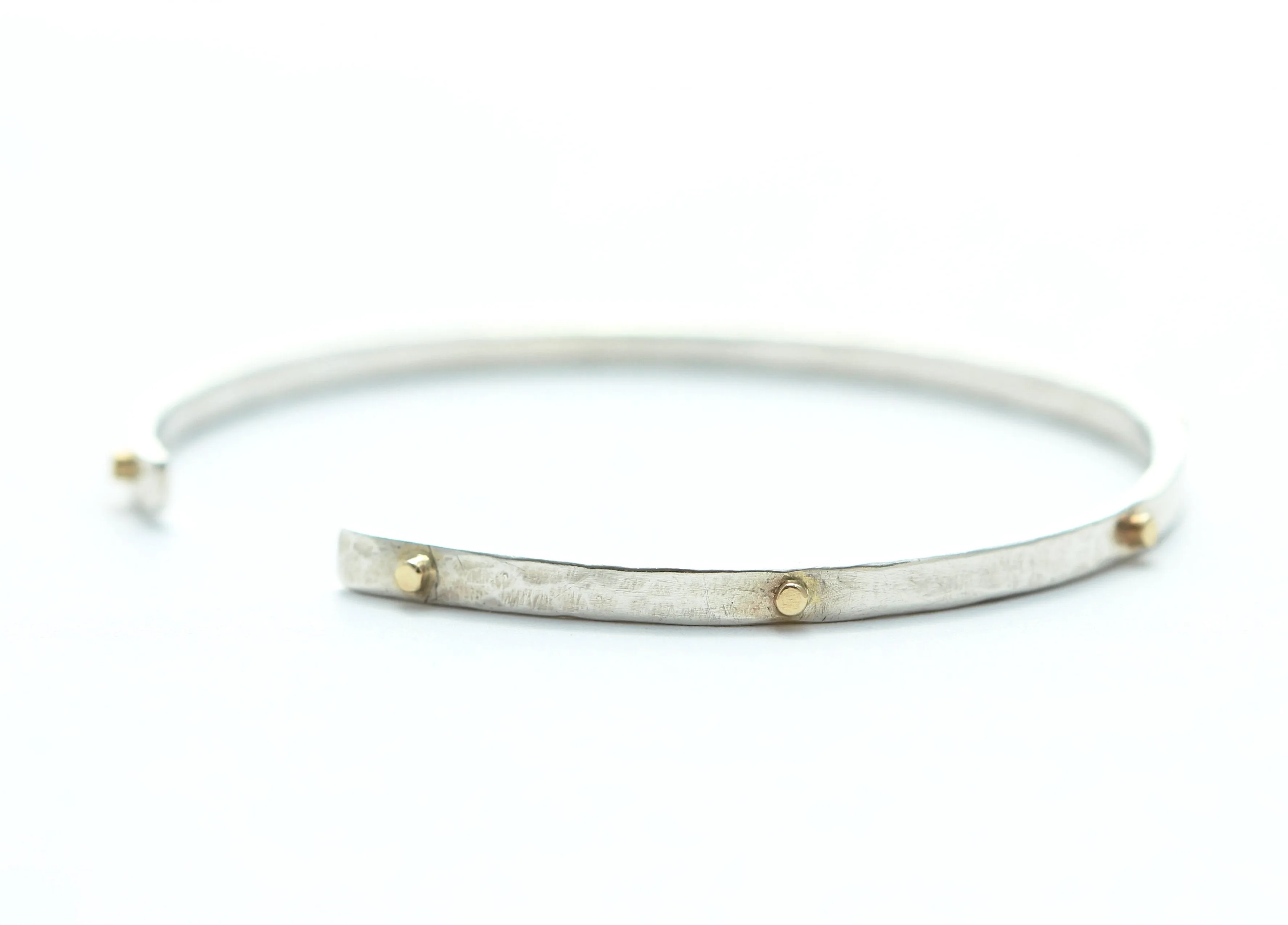Thin hammered cuff bracelet with 8 gold wires