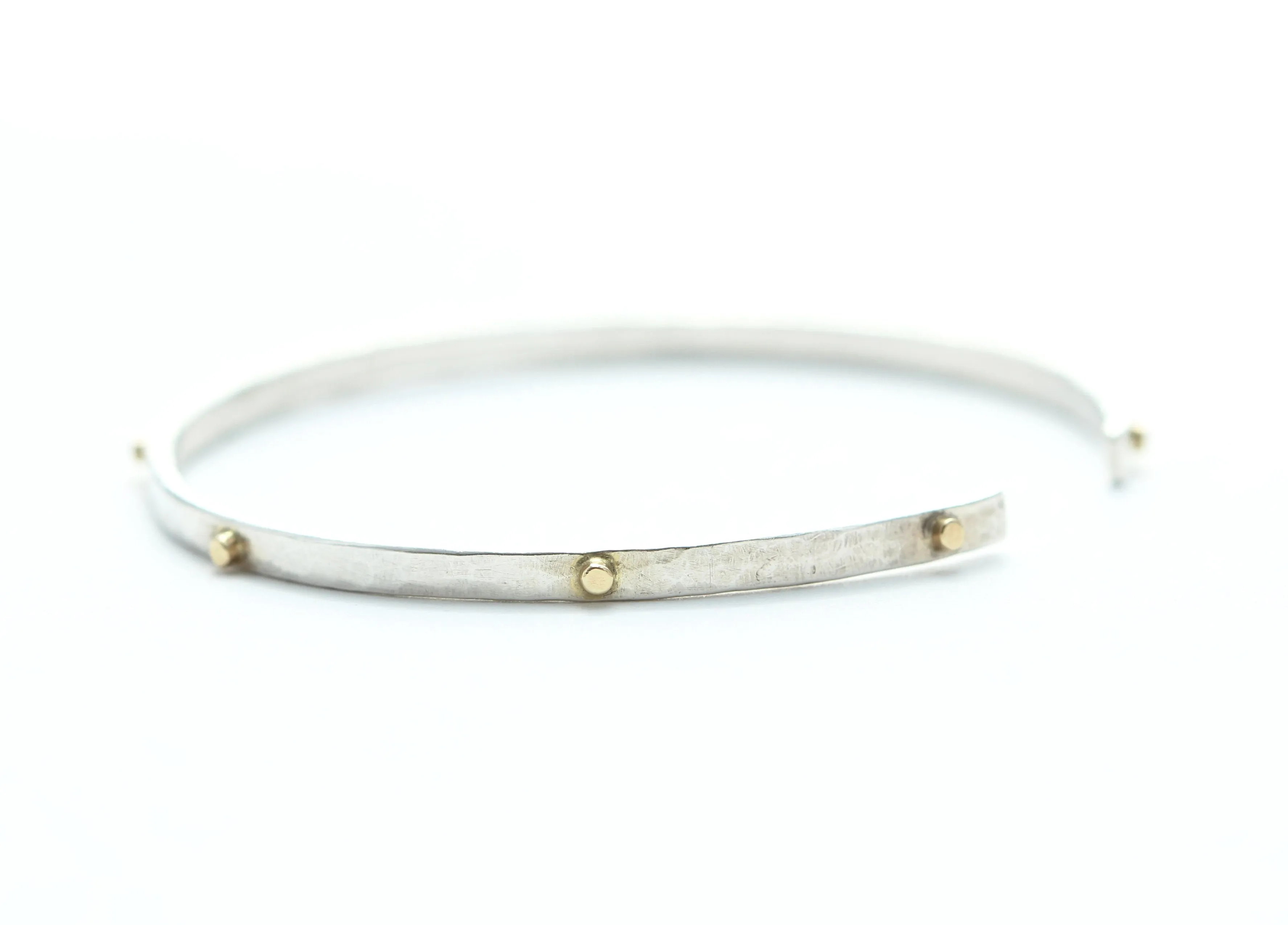 Thin hammered cuff bracelet with 8 gold wires
