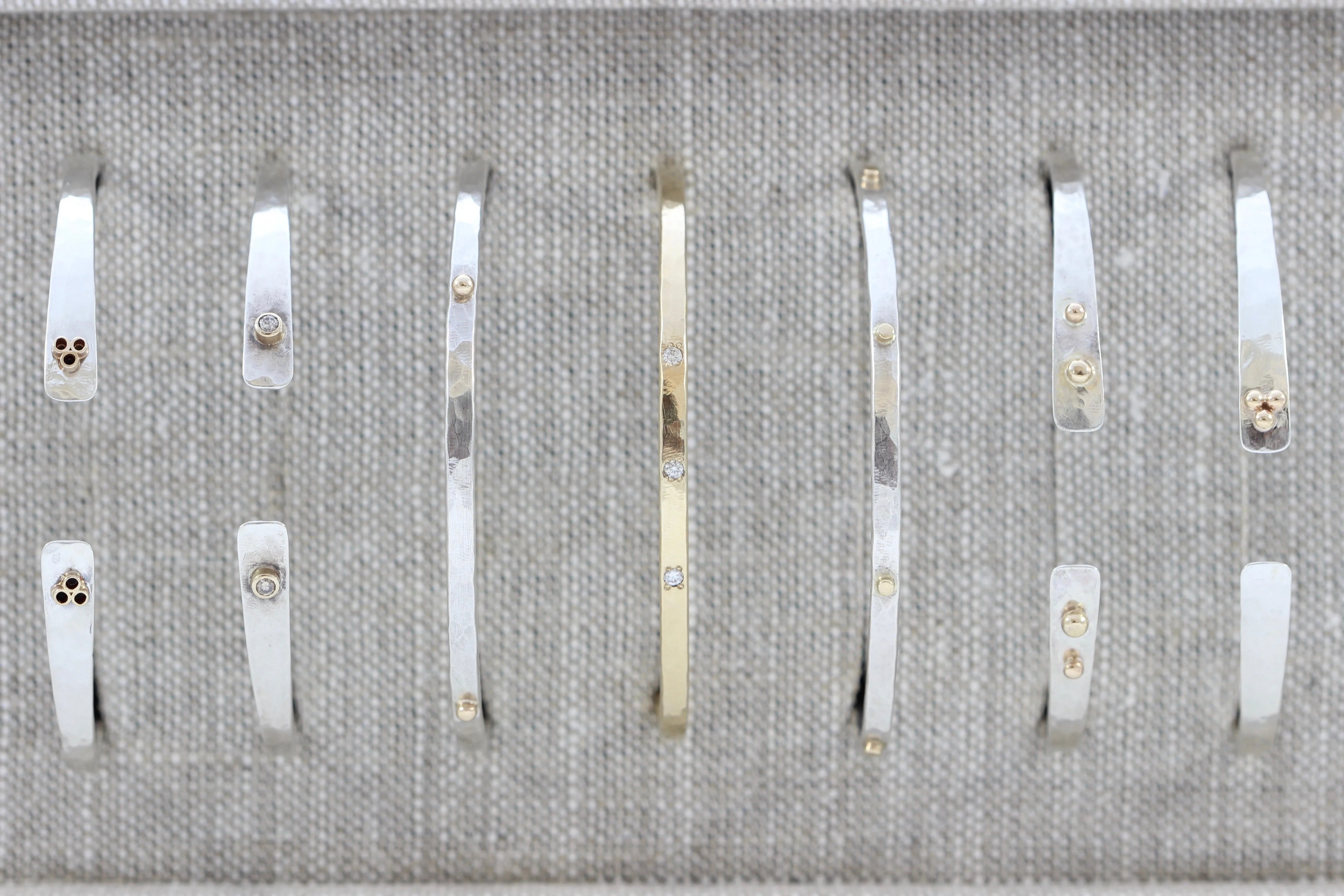 Thin hammered cuff bracelet with 8 gold wires