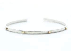 Thin hammered cuff bracelet with 8 gold wires